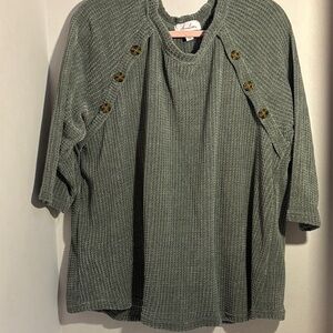 Women’s waffle print sweater in new condition